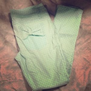 Mint green polka dot skinny jeans